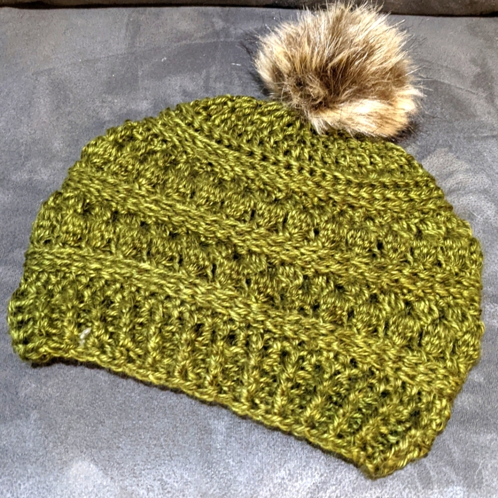 New handmade crochet green textured beanie with faux fur pompom